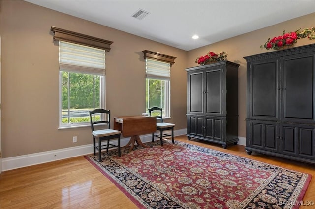 4160 W Bonanza Dr, Beverly Hills, FL 34465 - living area featuring healthy amount of natural light, light wood-type flooring, baseboards, and recessed lighting