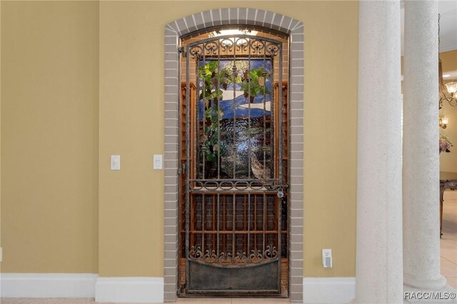 4160 W Bonanza Dr, Beverly Hills, FL 34465 - view of exterior entry with a gate