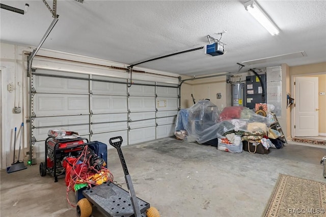 garage with a garage door opener and electric water heater