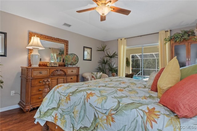 bedroom featuring baseboards, visible vents, ceiling fan, wood finished floors, and access to outside