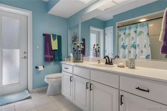 bathroom featuring baseboards, toilet, tile patterned floors, curtained shower, and vanity