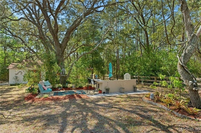 view of yard with fence