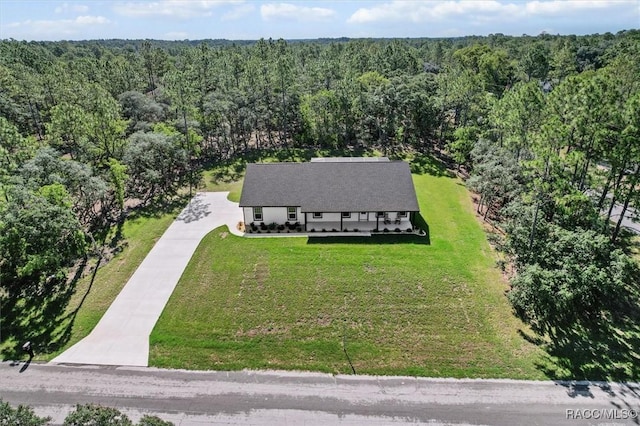 5379 N Nakoma Dr, Beverly Hills, FL 34465 - view from above of property featuring a heavily wooded area