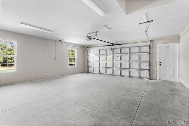 5379 N Nakoma Dr, Beverly Hills, FL 34465 - garage featuring a garage door opener
