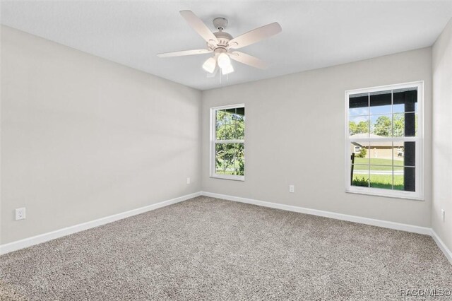 5379 N Nakoma Dr, Beverly Hills, FL 34465 - empty room with carpet floors and ceiling fan