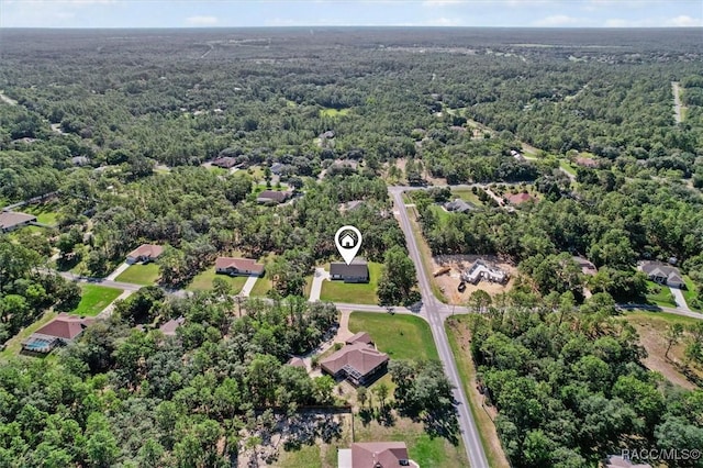 5379 N Nakoma Dr, Beverly Hills, FL 34465 - view of property location featuring a forest