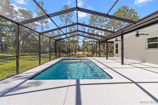 5379 N Nakoma Dr, Beverly Hills, FL 34465 - outdoor pool with a patio area, ceiling fan, and glass enclosure