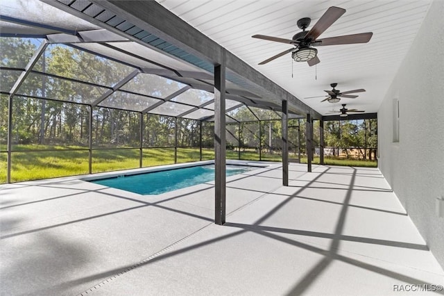 5379 N Nakoma Dr, Beverly Hills, FL 34465 - swimming pool with ceiling fan, a patio area, a lawn, and glass enclosure