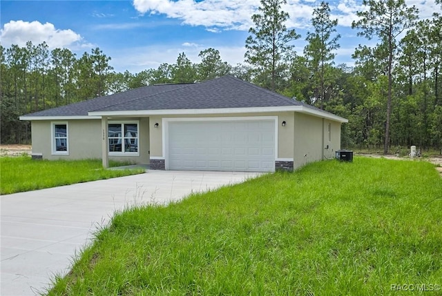 1370 SW Obee Ridge Rd, Dunnellon, FL 34430 - view of front of home with stucco siding, concrete driveway, a front lawn, an attached garage, and a shingled roof