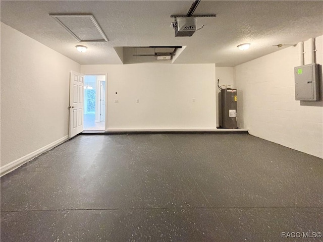 1370 SW Obee Ridge Rd, Dunnellon, FL 34430 - garage with water heater, electric panel, and a garage door opener