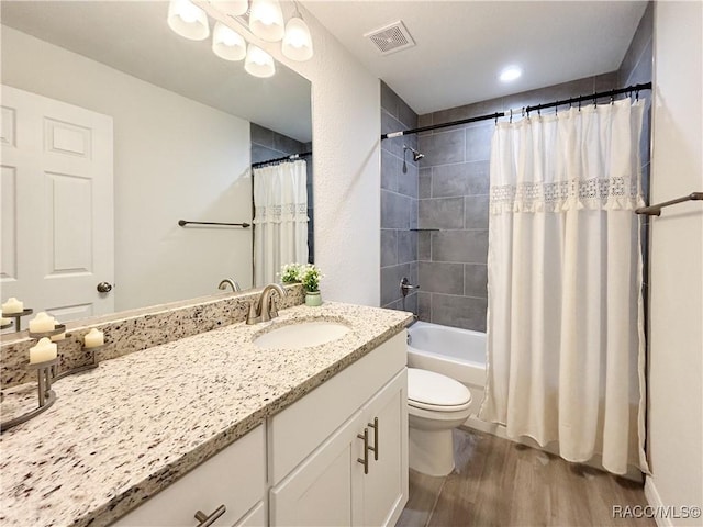 1370 SW Obee Ridge Rd, Dunnellon, FL 34430 - full bathroom with wood finished floors, vanity, and shower / bathtub combination with curtain