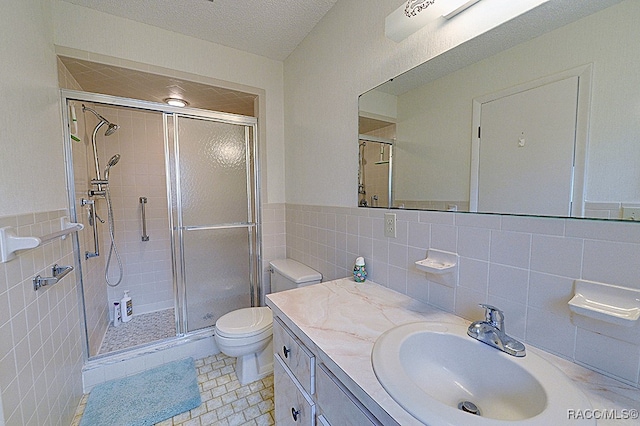 bathroom featuring a textured ceiling, tile walls, tile patterned flooring, toilet, and a shower with shower door