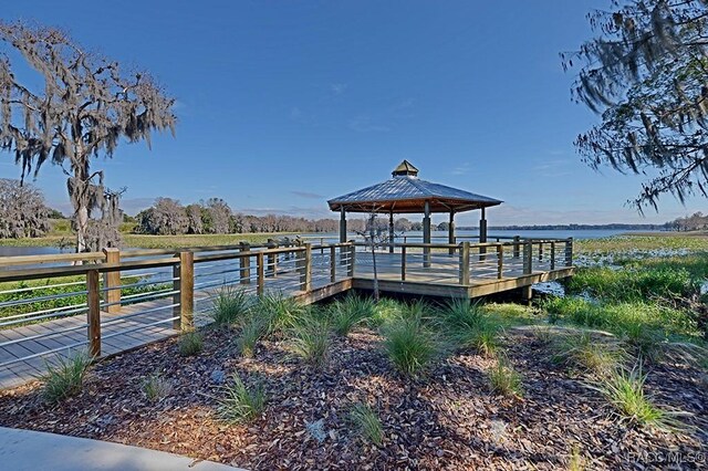 4911 S Skyblue Dr, Inverness, FL 34452 - dock area with a water view, a rural view, and a gazebo