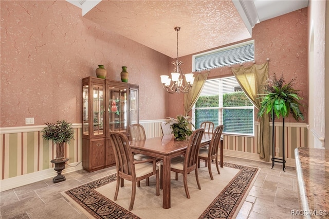 dining room with a chandelier