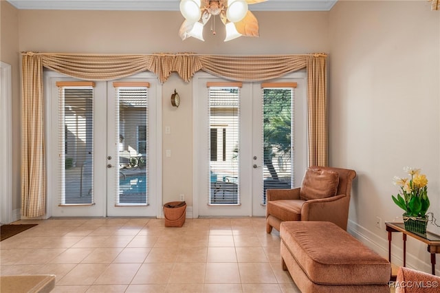 doorway with ceiling fan, light tile patterned floors, and french doors