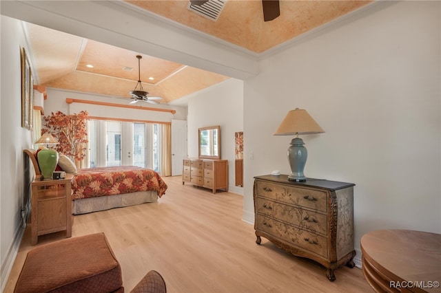 bedroom with ceiling fan, light hardwood / wood-style floors, and crown molding