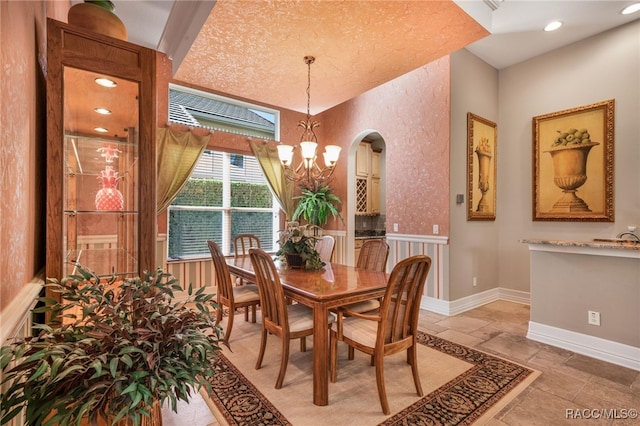 dining room featuring a notable chandelier