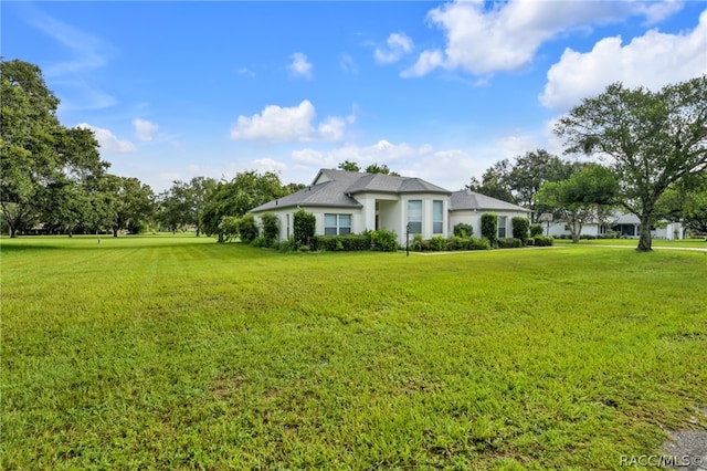 exterior space featuring a front lawn