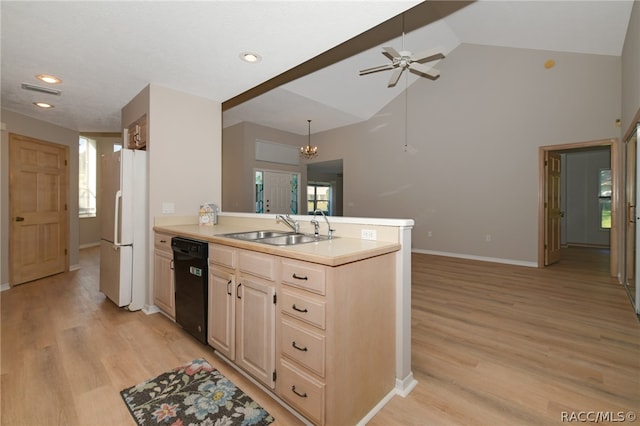 kitchen with light wood-type flooring, sink, pendant lighting, black dishwasher, and white fridge