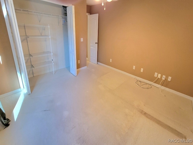 unfurnished bedroom with a closet