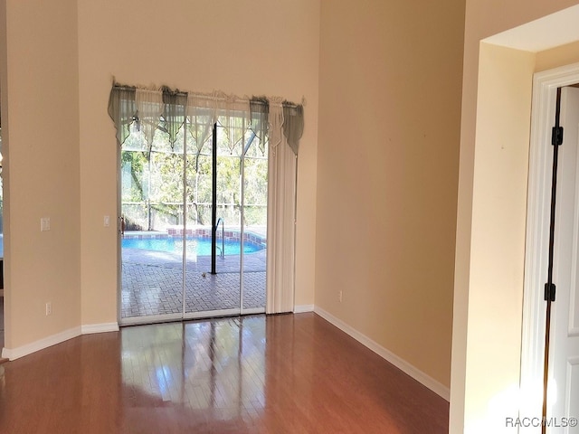 empty room featuring hardwood / wood-style floors