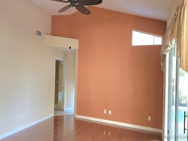 empty room featuring ceiling fan and light hardwood / wood-style floors