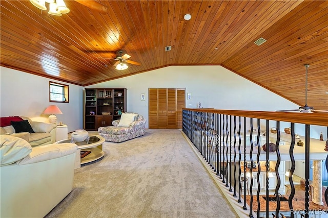 living area featuring carpet flooring, vaulted ceiling, wood ceiling, and a ceiling fan