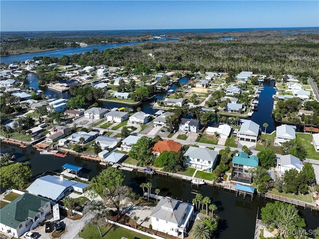 aerial view featuring a water view and a residential view