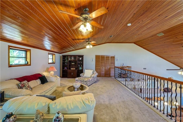 carpeted living area with wooden ceiling, vaulted ceiling, and a ceiling fan