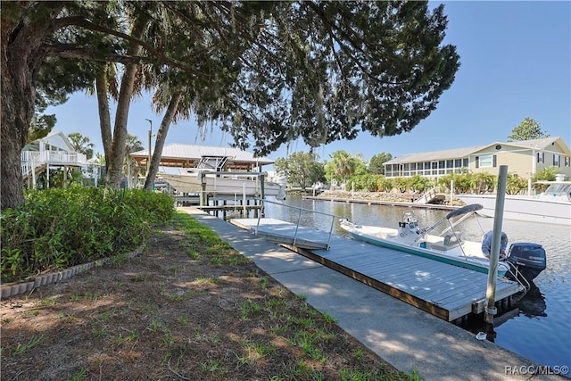 dock area with a water view
