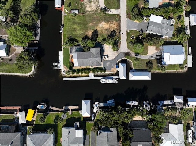 birds eye view of property with a residential view