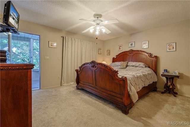 bedroom with access to outside, baseboards, a textured ceiling, a ceiling fan, and light colored carpet