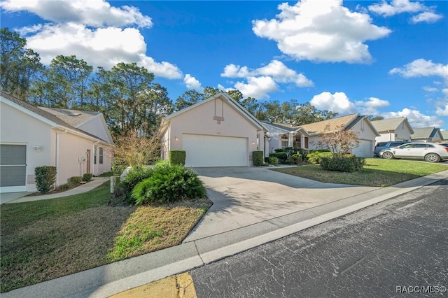 ranch-style home with a garage and a front yard