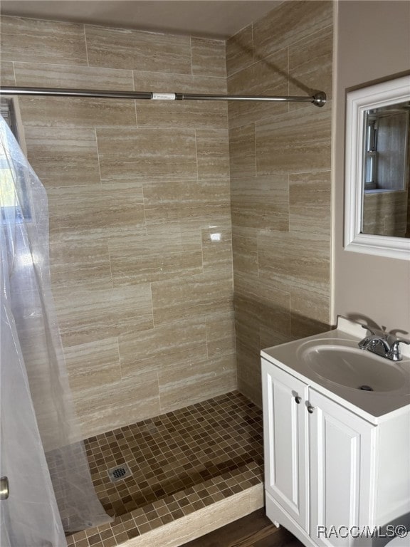 bathroom with vanity and a shower with curtain