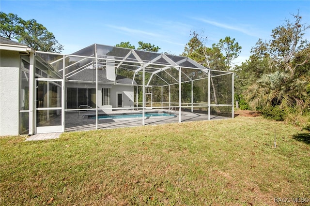 exterior space with a lanai and a patio area