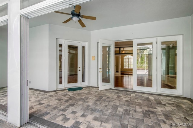 view of patio with ceiling fan