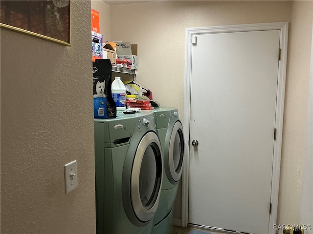 laundry area featuring washing machine and dryer