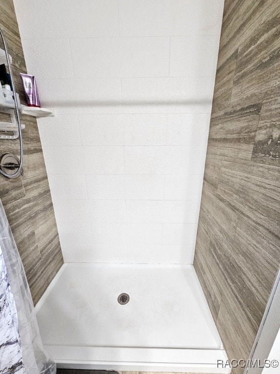 bathroom with walk in shower