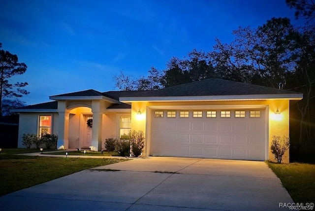 view of front of property featuring a garage