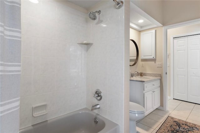 bathroom featuring toilet, vanity, shower / bathing tub combination, and tile patterned flooring