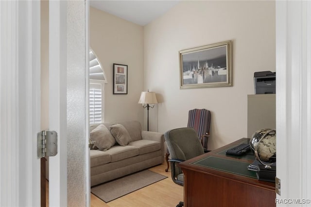 office with light wood-style floors