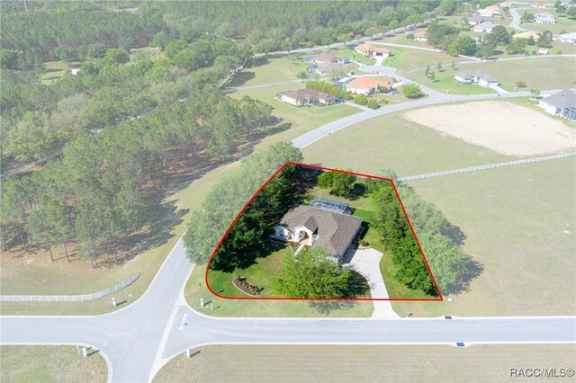 aerial view with a wooded view