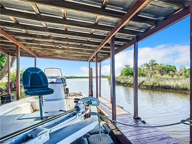 dock area featuring a water view