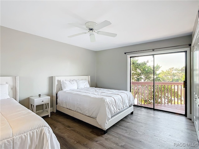 bedroom with dark wood-style floors, access to outside, and ceiling fan