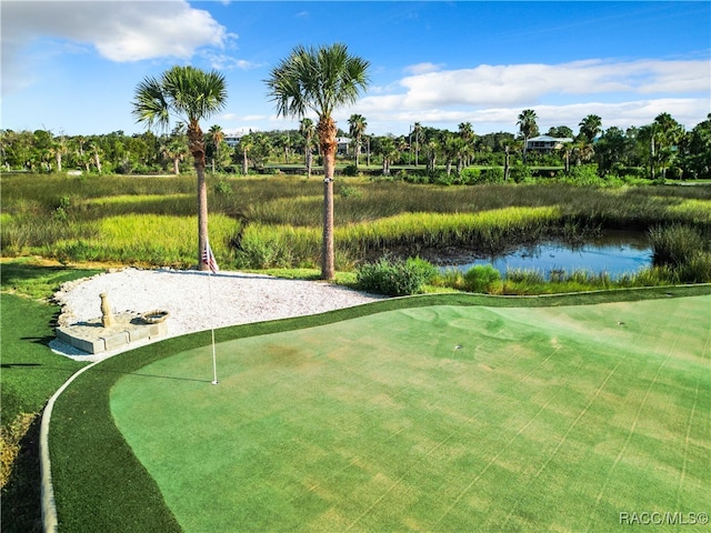 surrounding community featuring a water view