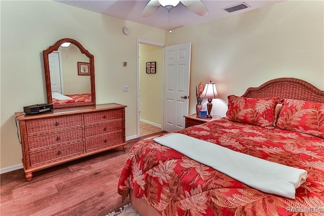 bedroom featuring ceiling fan and hardwood / wood-style flooring