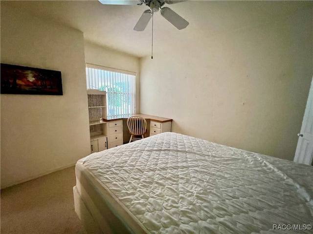 bedroom featuring carpet and ceiling fan