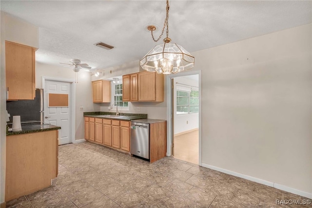 53 S Columbus St, Beverly Hills, FL 34465 - kitchen with appliances with stainless steel finishes, a ceiling fan, a chandelier, dark countertops, and light brown cabinets