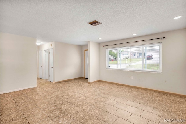 53 S Columbus St, Beverly Hills, FL 34465 - empty room with recessed lighting and a textured ceiling
