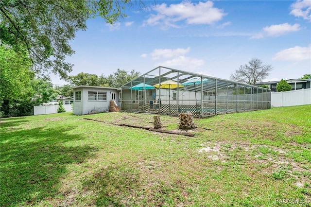 53 S Columbus St, Beverly Hills, FL 34465 - fenced backyard featuring glass enclosure